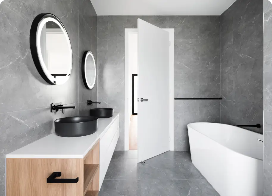 Finished restroom interior with doorway and fixtures requiring accessibility planning